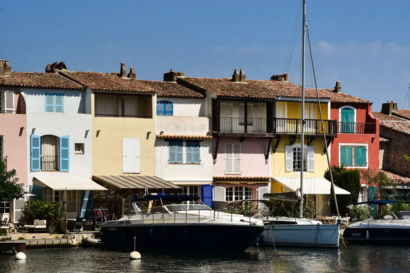 A picturesque view of boats along the canals of Port Grimaud in the French Riviera.