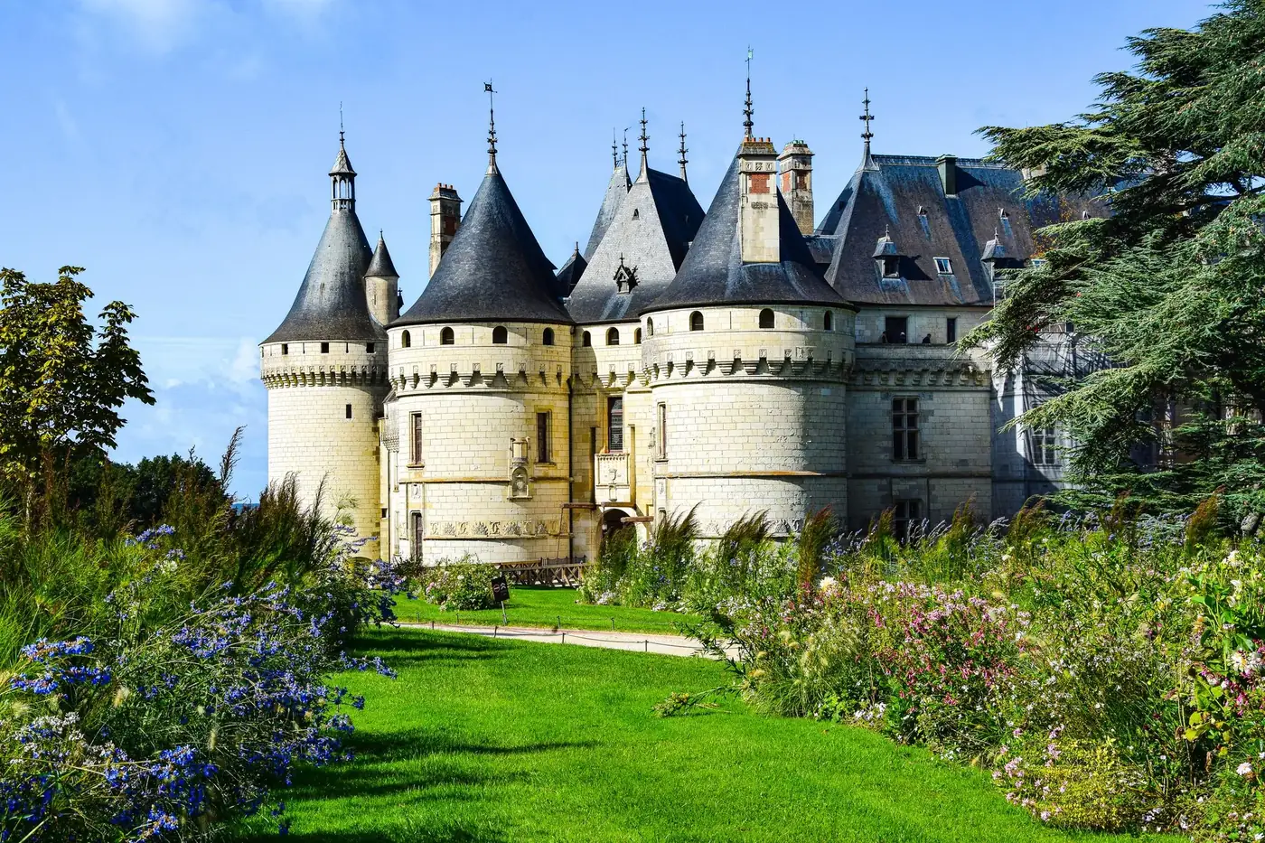 Stunning view of Château de Chaumont with lush gardens, a renowned French landmark.