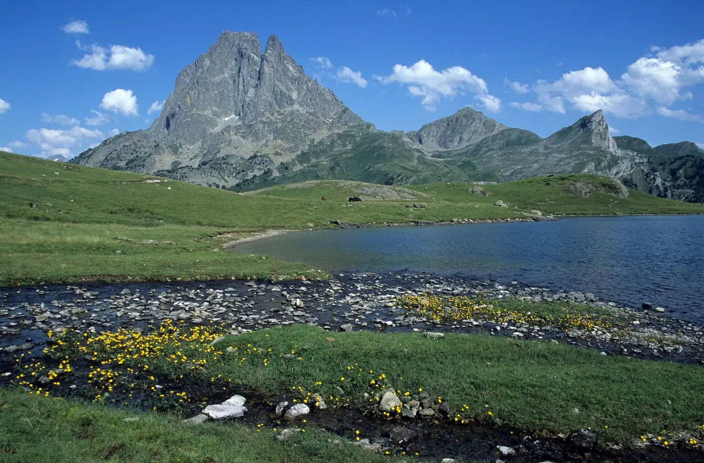 Beautiful landscape of a mountain and lake in Laruns, France.